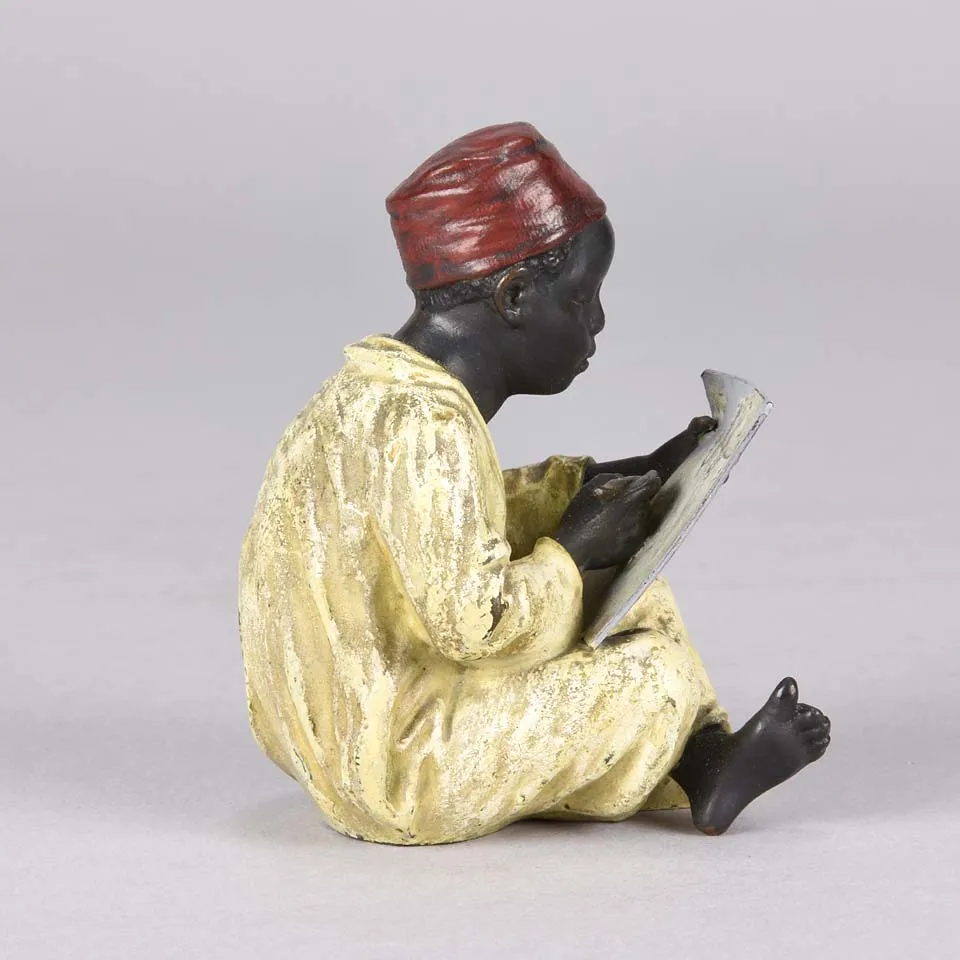 "Seated Arab Boy Writing" by Franz Bergman