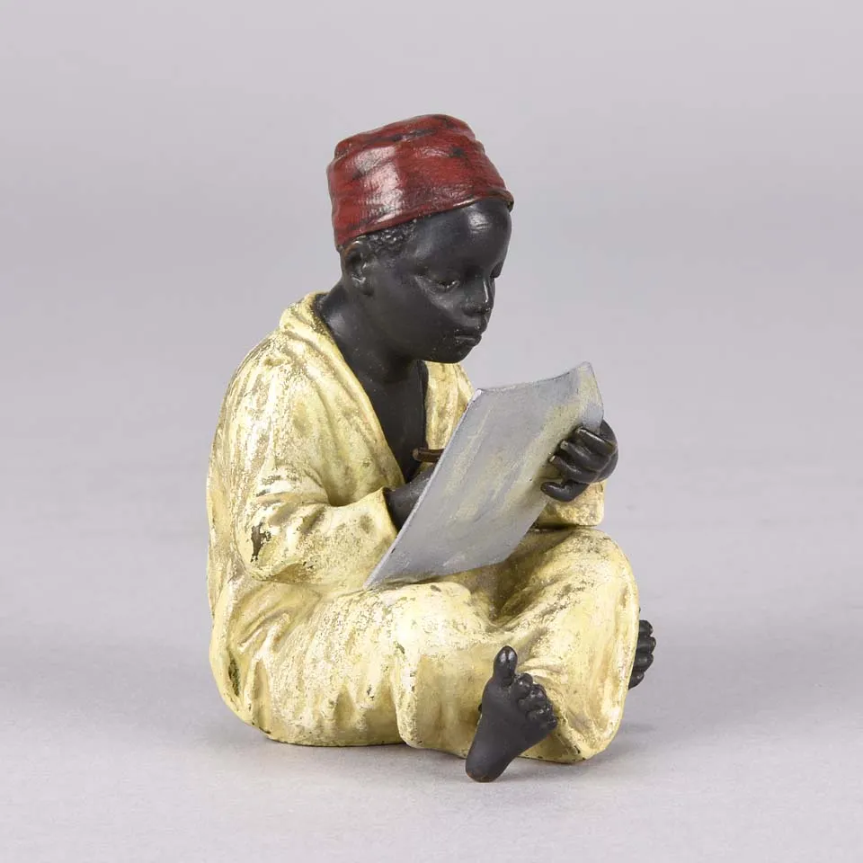 "Seated Arab Boy Writing" by Franz Bergman