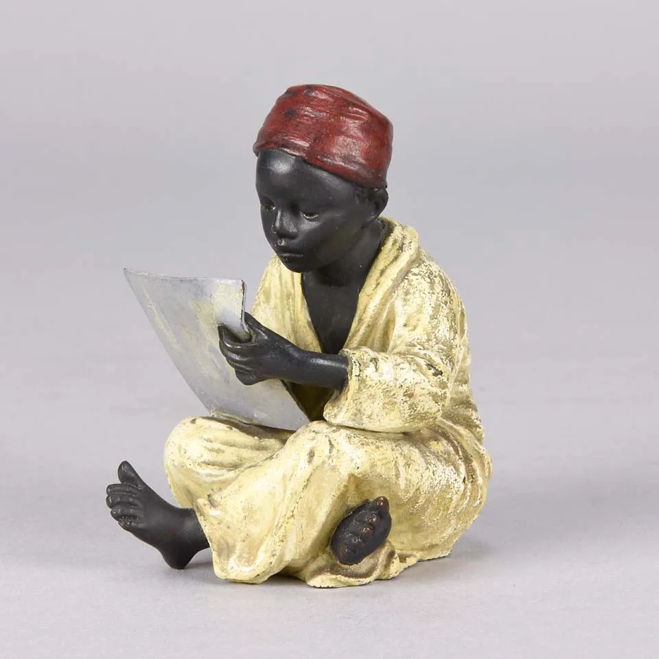 "Seated Arab Boy Writing" by Franz Bergman